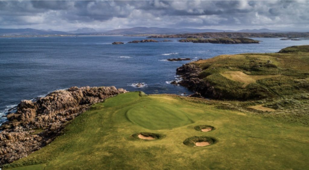 Picture of The Greatest Par 3 in the World, hole number 6 at Cruit Island Golf Club included in the article Where Golf Gods Relax by Michael Duranko of GolfToons.